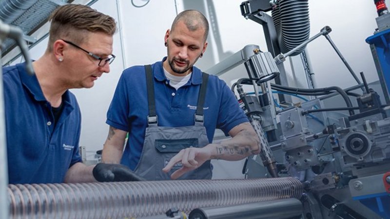 Masterflex employees during the production of PU spiral hoses